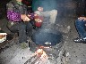 Remove rice add more lard and a little rice cook over hot ashes to brown the rice