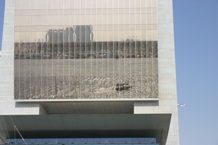 Reflection of our boat in mirrored windows